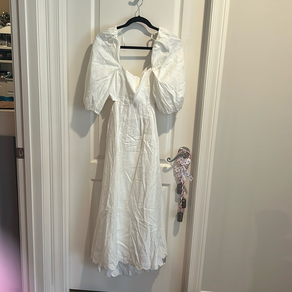 Ivory colored long dress, open back